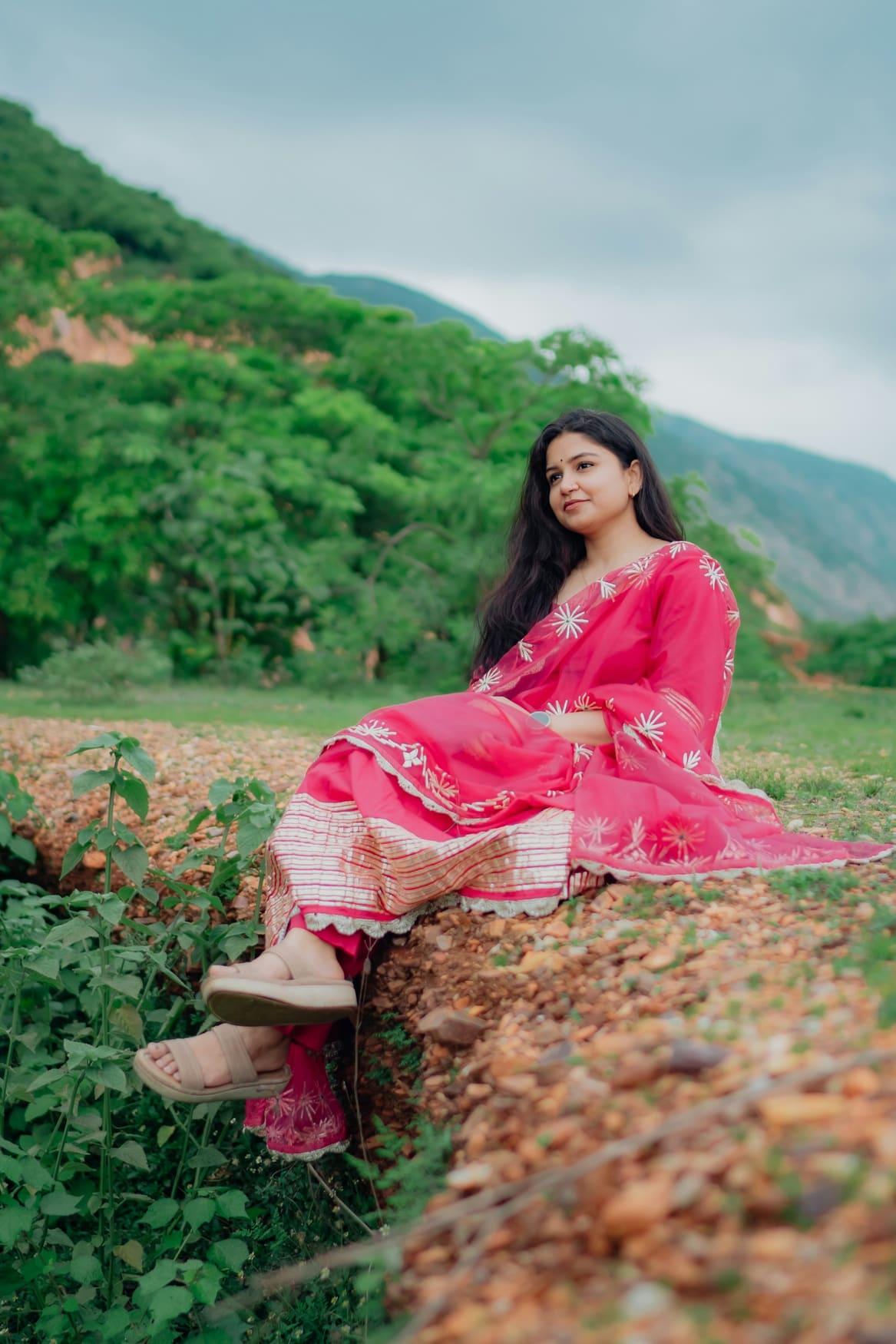 Woman in a rose pink block-printed kurta and pants — view 2 of 2